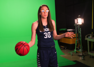 Breanna Stewart, UConn Women's Basketball player stands in front of green screen as part of a photo shoot at the NCAA Final Four Tournament. 