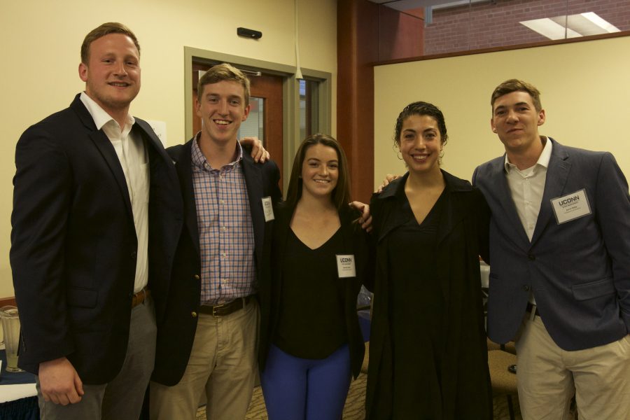 Graduating seniors in the Sport Management Program participated in a special ceremony to recognize and celebrate their graduation. The event wsa held in Gentry 144 on April 26, 2017. Pictured: Bucky Gumbrewicz, Tyler Axon, Sofia Read, Chelsea Zabel