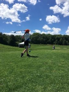 Golfer on a beautiful day during summer 2017 internship experience